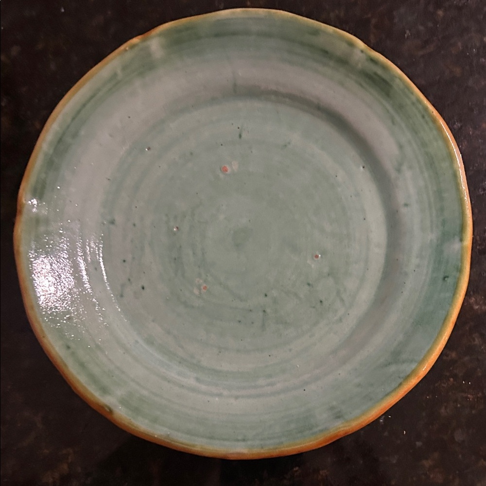 Green vintage handmade ceramic plate